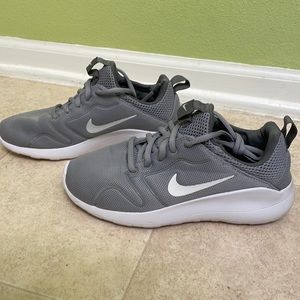 Grey Nike walking shoes